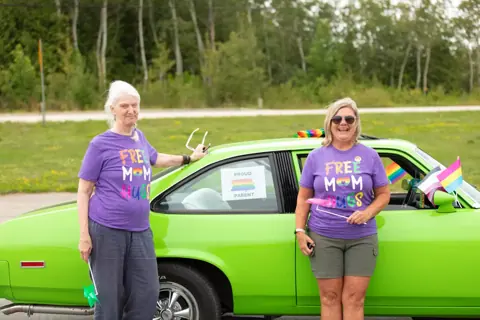 A moment of connection at the Pride parade, 2024