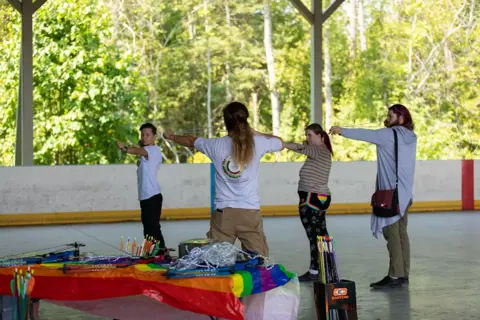 Archery with Rainbow Hood at Pride Manitoulin, 2024