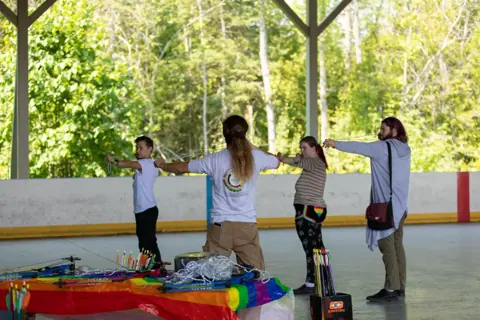 Archery with Rainbow Hood at Pride Manitoulin, 2024