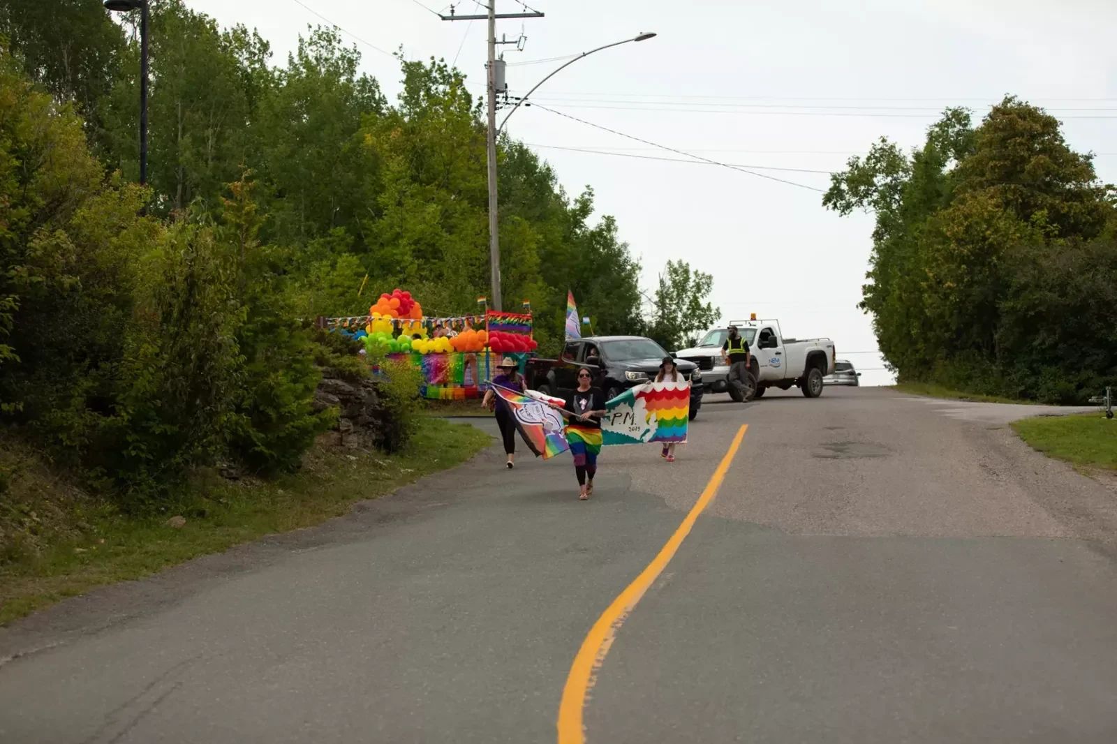 Community members leading the Pride parade, 2024